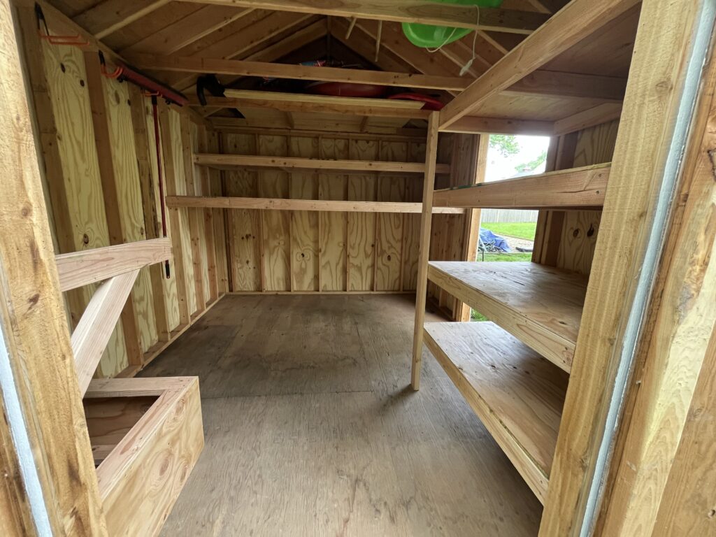 Shed Storage Solutions in West Hartford — corner shelf installation